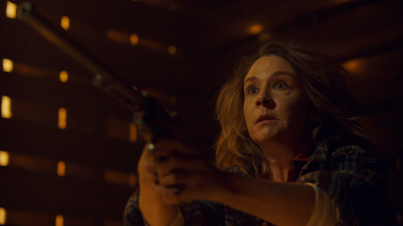 Mama Earp holds up Peacemaker