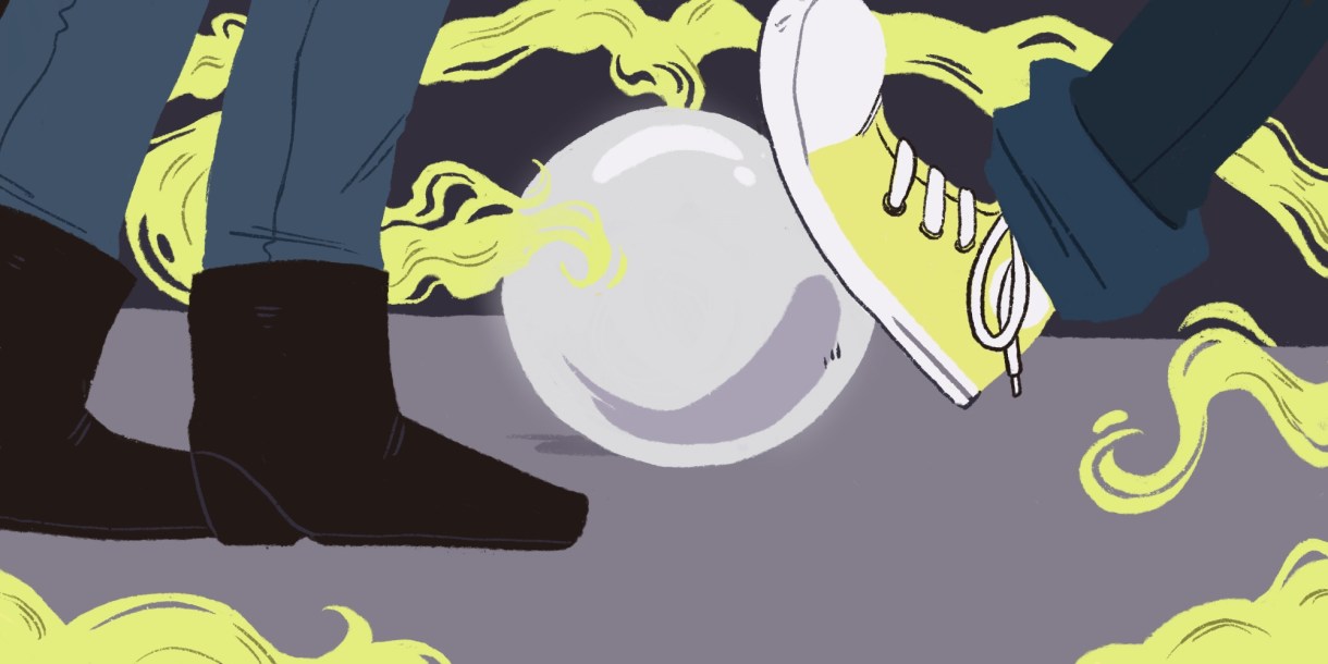 a glass orb on the ground, two pairs of feet standing around it. a yellow converse kicks at the orb. there's an eerie yellow smoke surrounding the scene.