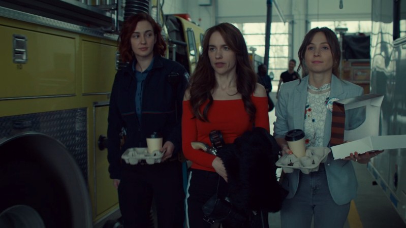 Nicole, Wynonna and Waverly walk out of the fire station 