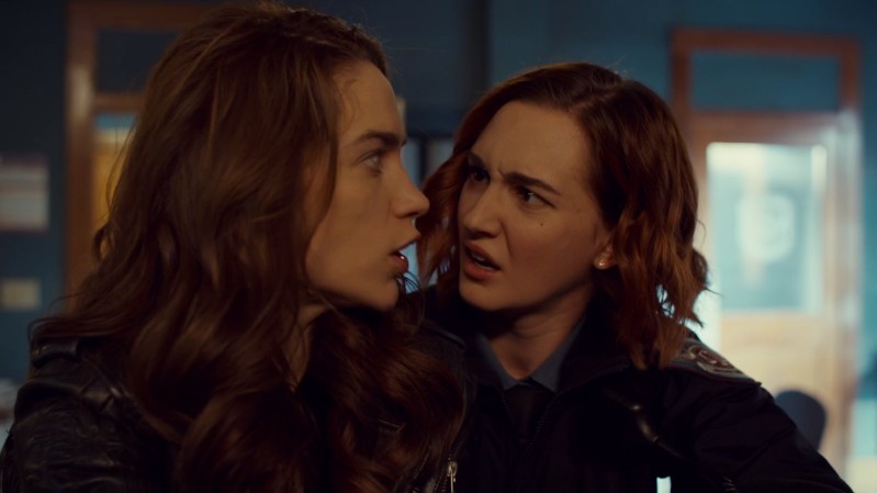 Nicole and Wynonna's faces are very close to each other