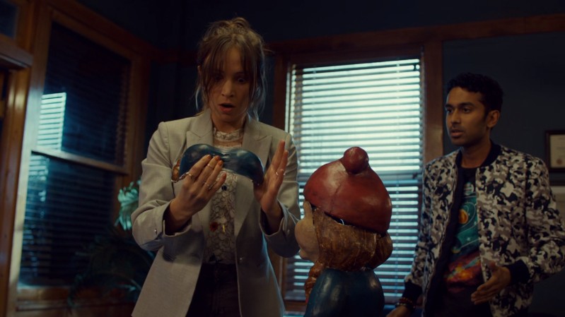 Waverly looks at the gnome boobs excited but confused