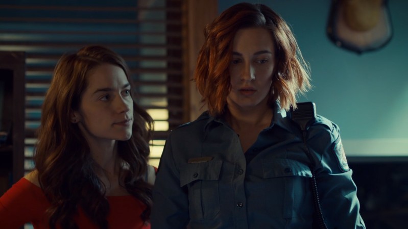 Nicole looks stressed about the broken stuff, Wynonna looks at her accusingly