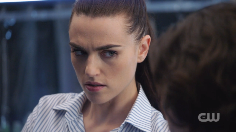 Lena furrows her brow at the patient