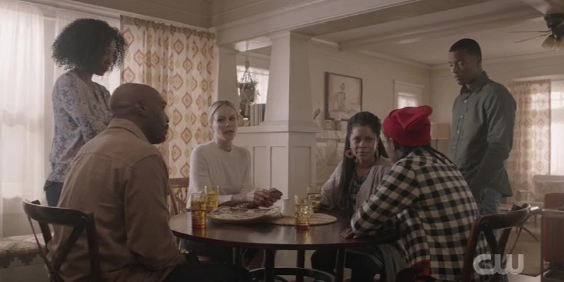 Coop's family gathers around the table to discuss options. 