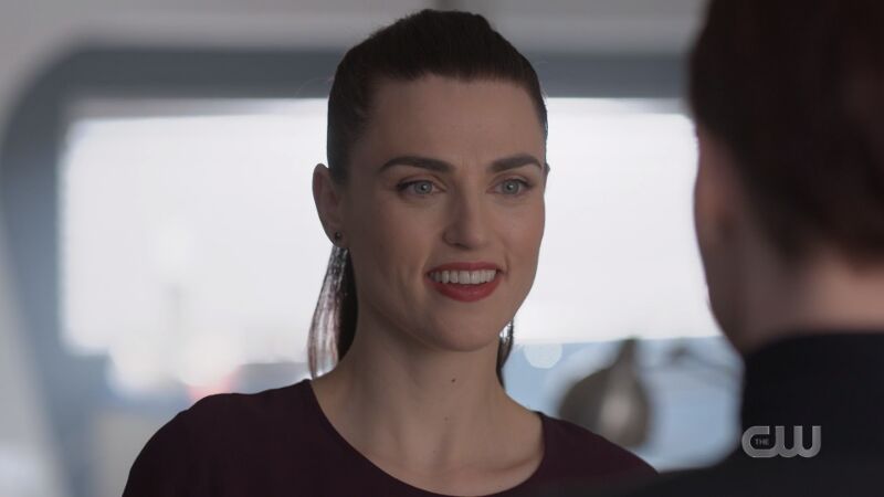 Lena smiles at Alex