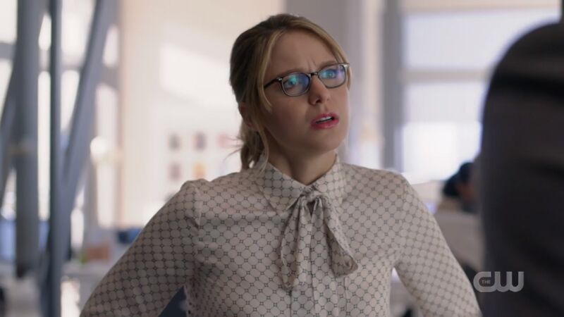 Kara has a button down with a fake little tie thing