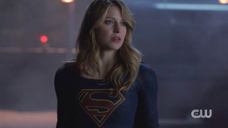 Supergirl stands proudly