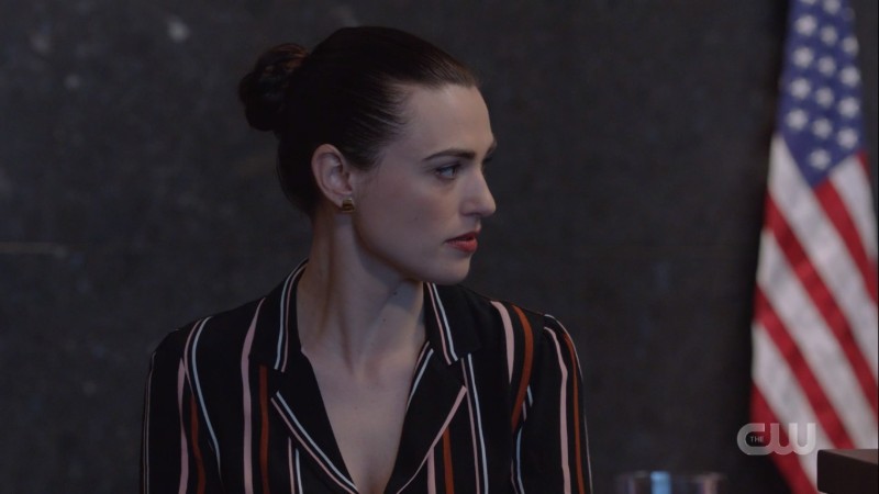 Lena is in court in a really cute stripey button-down