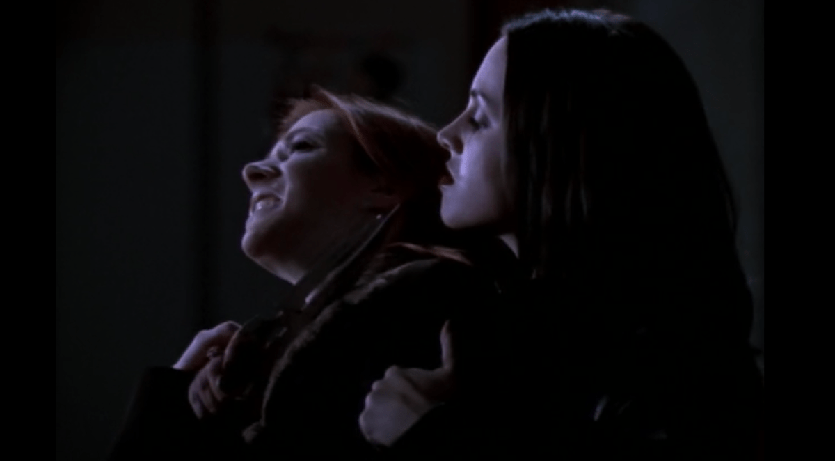 Faith holds a knife against Willow's neck on Buffy