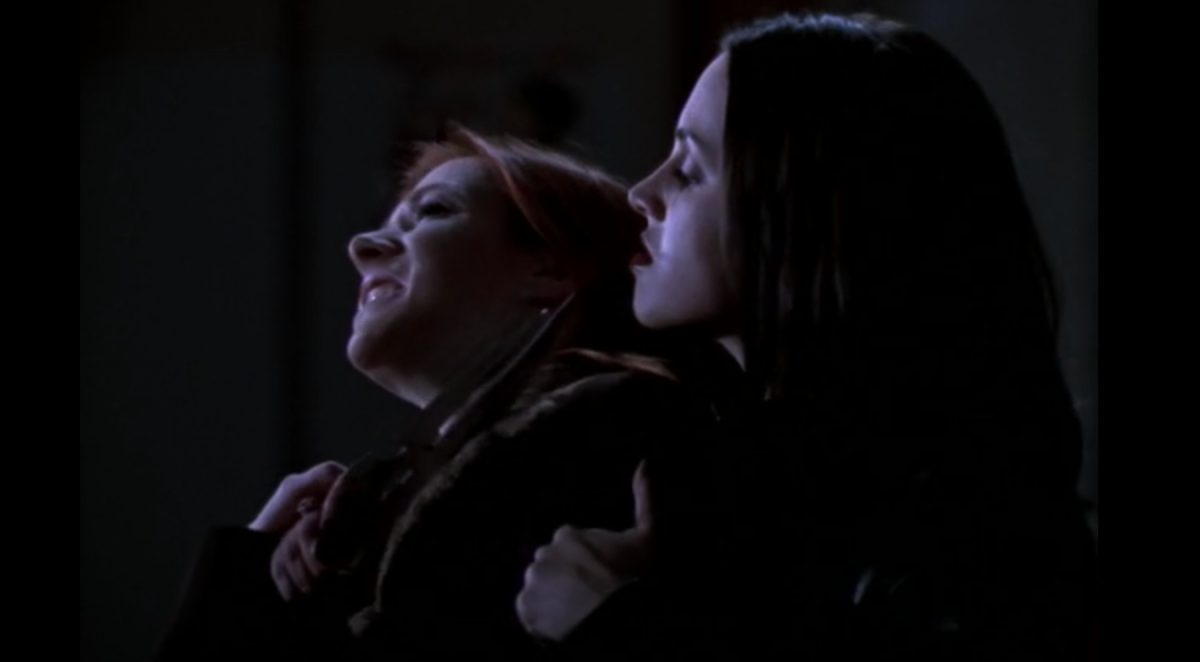 Faith holds a knife against Willow's neck on Buffy