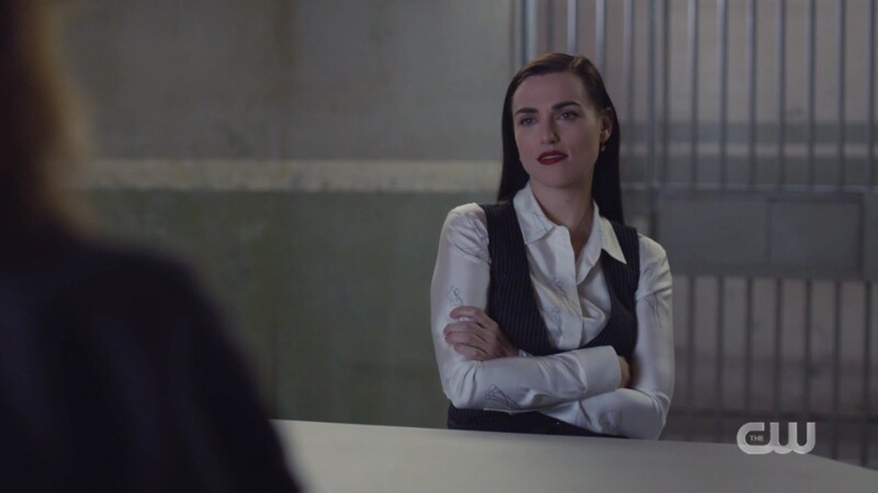 Lena crosses her arms STILL IN THE VEST