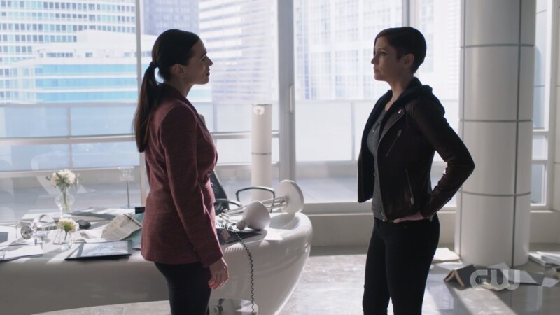 Lena and Alex talk in Lena's office