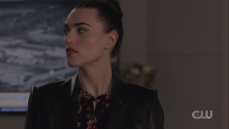 Lena looks toward Alex