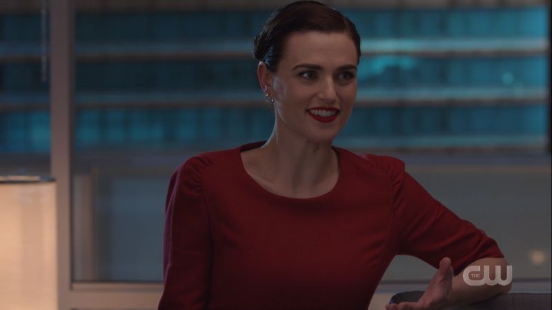 Lena smiles and her hair is pinned up all cute 