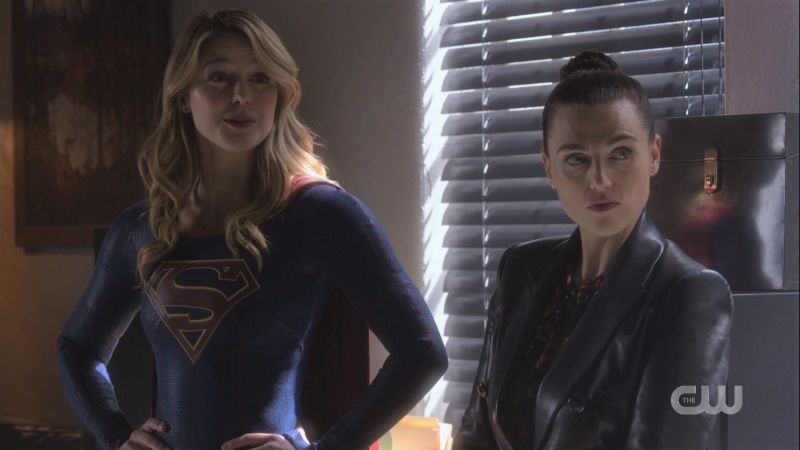 Supergirl and Lena are in slat-blind lighting looking like they're in a noir film