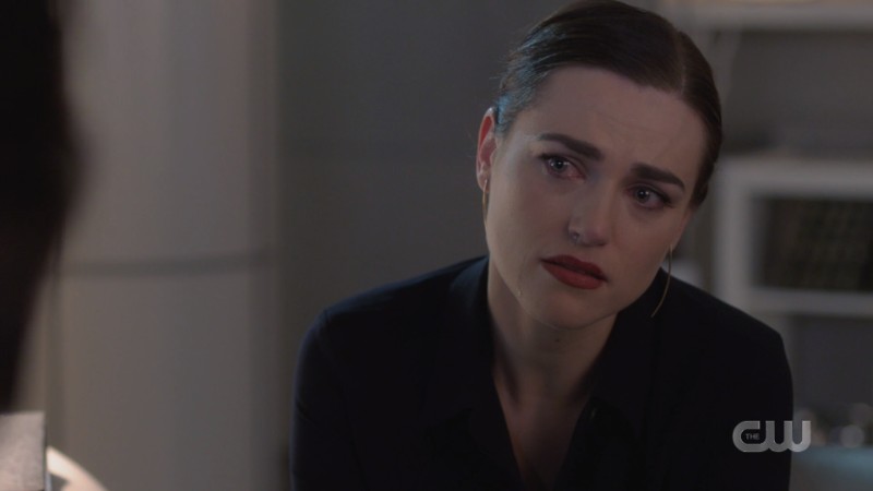 Lena listens thoughtfully and tearfully to Brainy