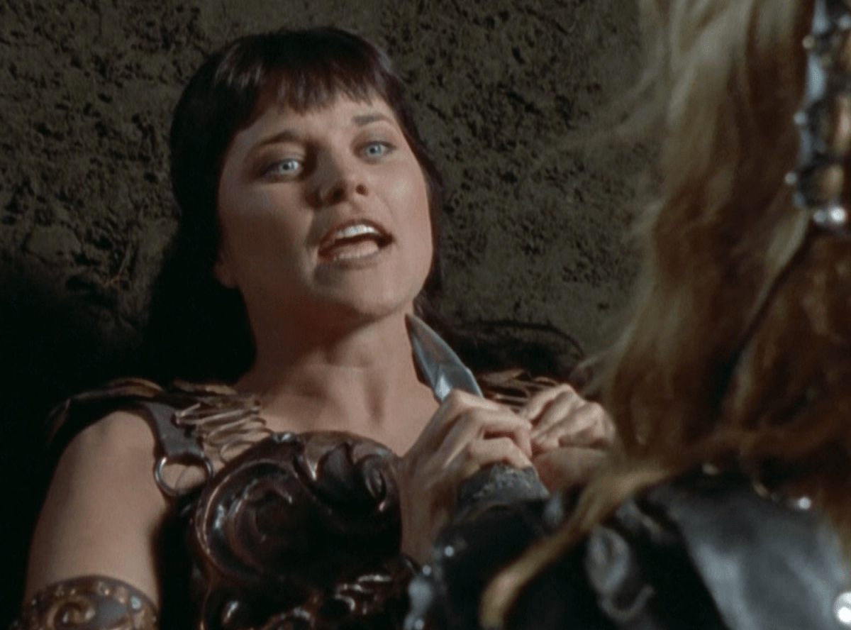 Someone holds a knife against Xena's throat on Xena: Warrior Princess