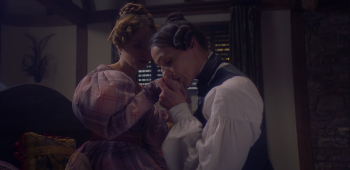 Anne Lister kissing Miss Walker's hand in the Snow White fuck cabin
