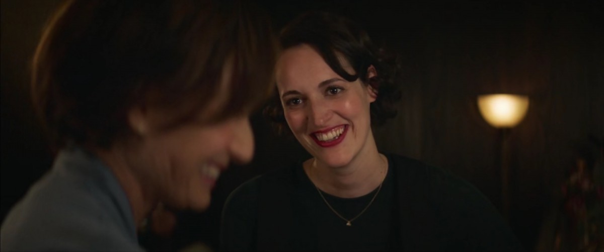 Image: Fleabag looks at Belinda, a lesbian priest, while they are both at a bar