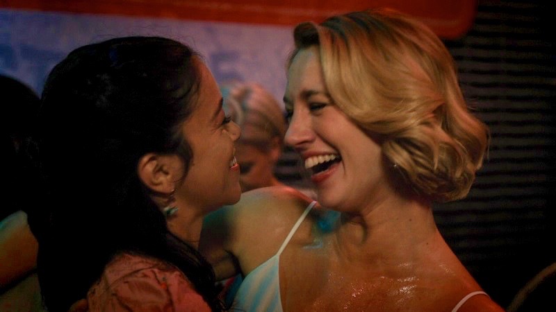 Jane and Petra share at dance at a local lesbian bar.