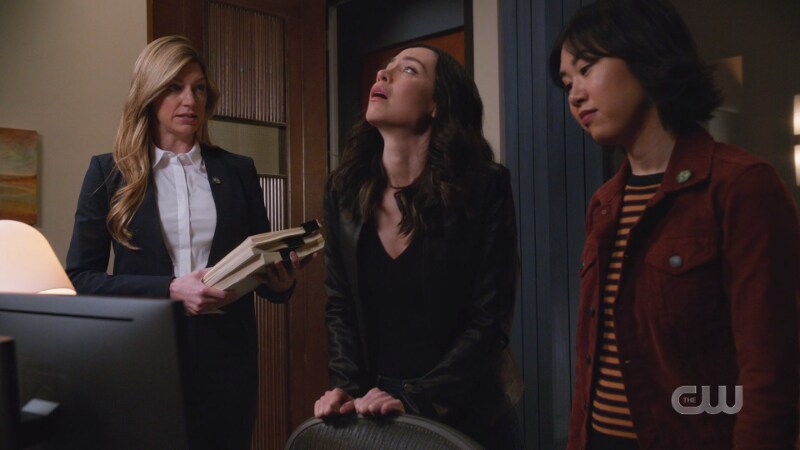 Ava, Nora and Mona are in Nora's new office, Nora looks stressed