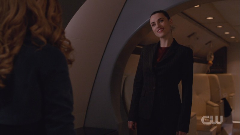 Lena smirks at Eve before kicking her ass