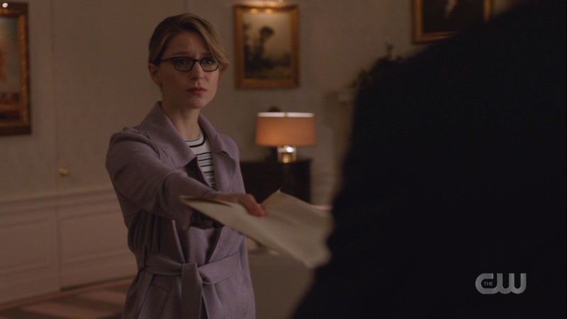 Kara gives the president an envelope