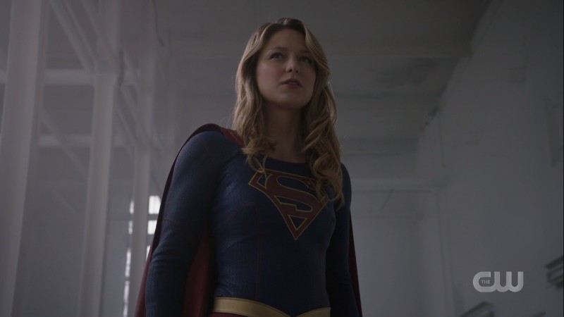 Supergirl stands proudly against her foe 