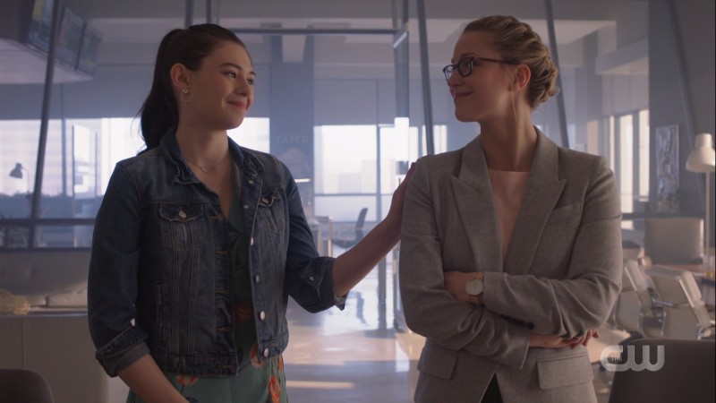 Nia touches Kara's shoulder supportively 