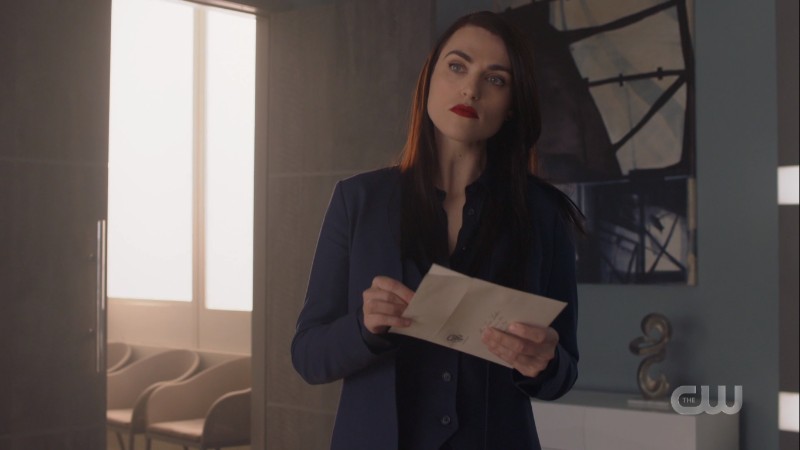 Lena holds a letter 