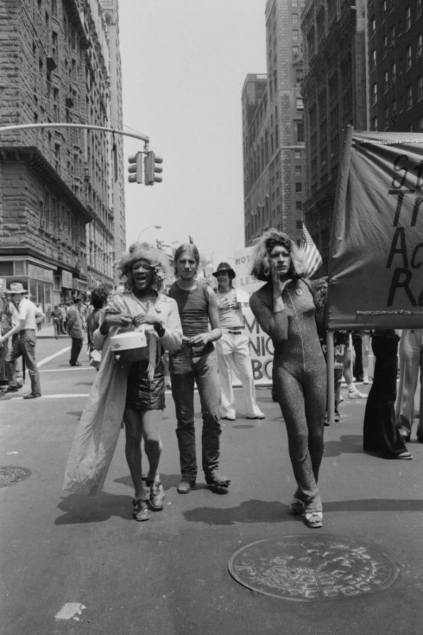 On a New York City street, trans activists Marsha P Johnson and Silvia Rivera lead their organisation, STAR, on a protest, holding aloft banners with various trans rights slogans