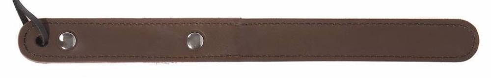 a skinny brown leather paddle