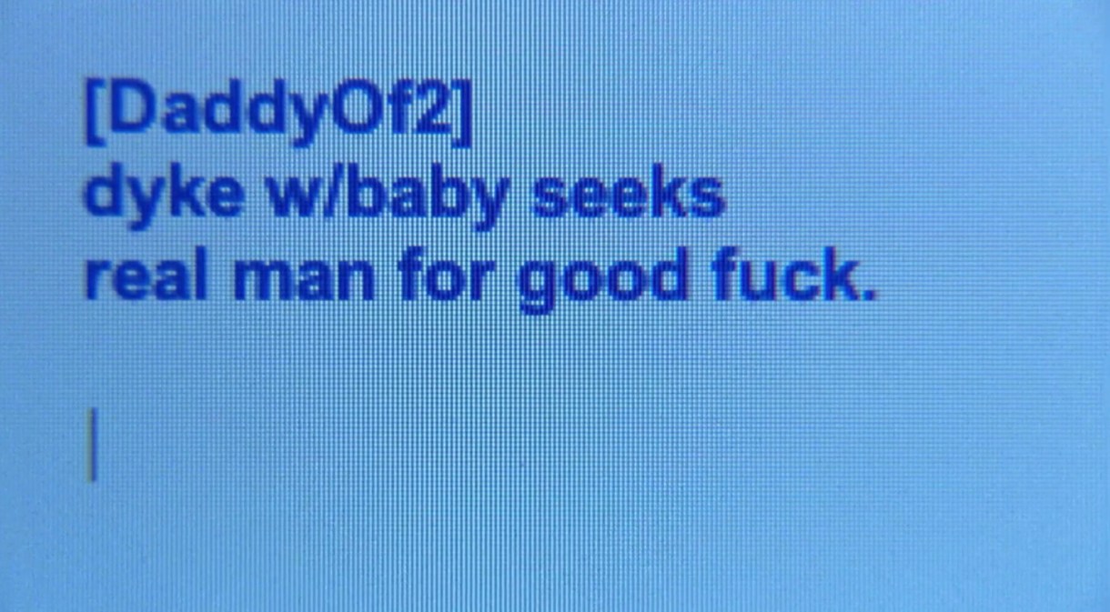The screen of a chat room that Tina has been in, talking to DaddyOf2. It shows dark blue text on a light blue background. The message reads, "dyke with baby seeks real man for good fuck."