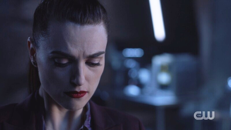 Lena looks down trying to fight her FEELINGS
