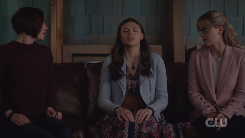 Nia closes her eyes on the couch with kara and alex
