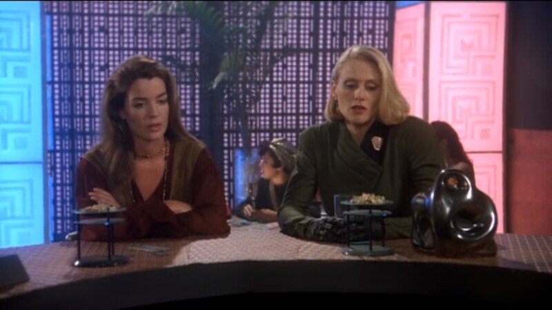 Susan Ivanova and Talia Winters. sit at a bar