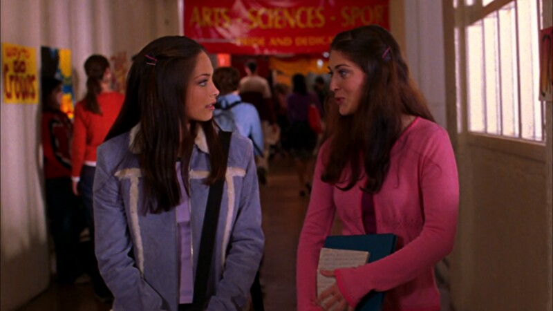 Tina Greer and Lana Lane walking down the high school hallway