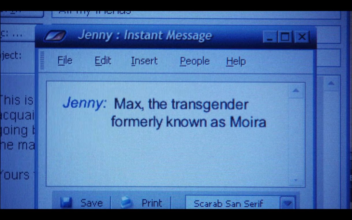 A blue-tinted computer screen showing an Instant Message window. Jenny has typed in the window: "Max, the transgender formerly known as Moira."