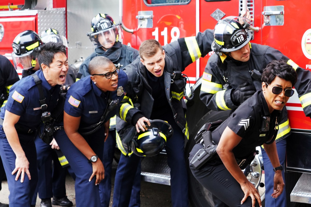 Image: The 9-1-1 team of first responders are grimacing from whatever it is they are all looking at. Everybody's faces are a real mixed bag to be honest. Angela Basset looks great as always. So does Hen, I love her. They're all in various uniforms.