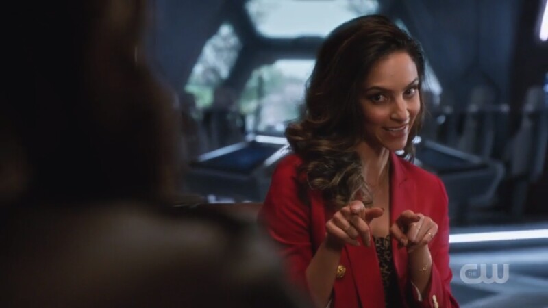 Zari deflects the question with some finger guns
