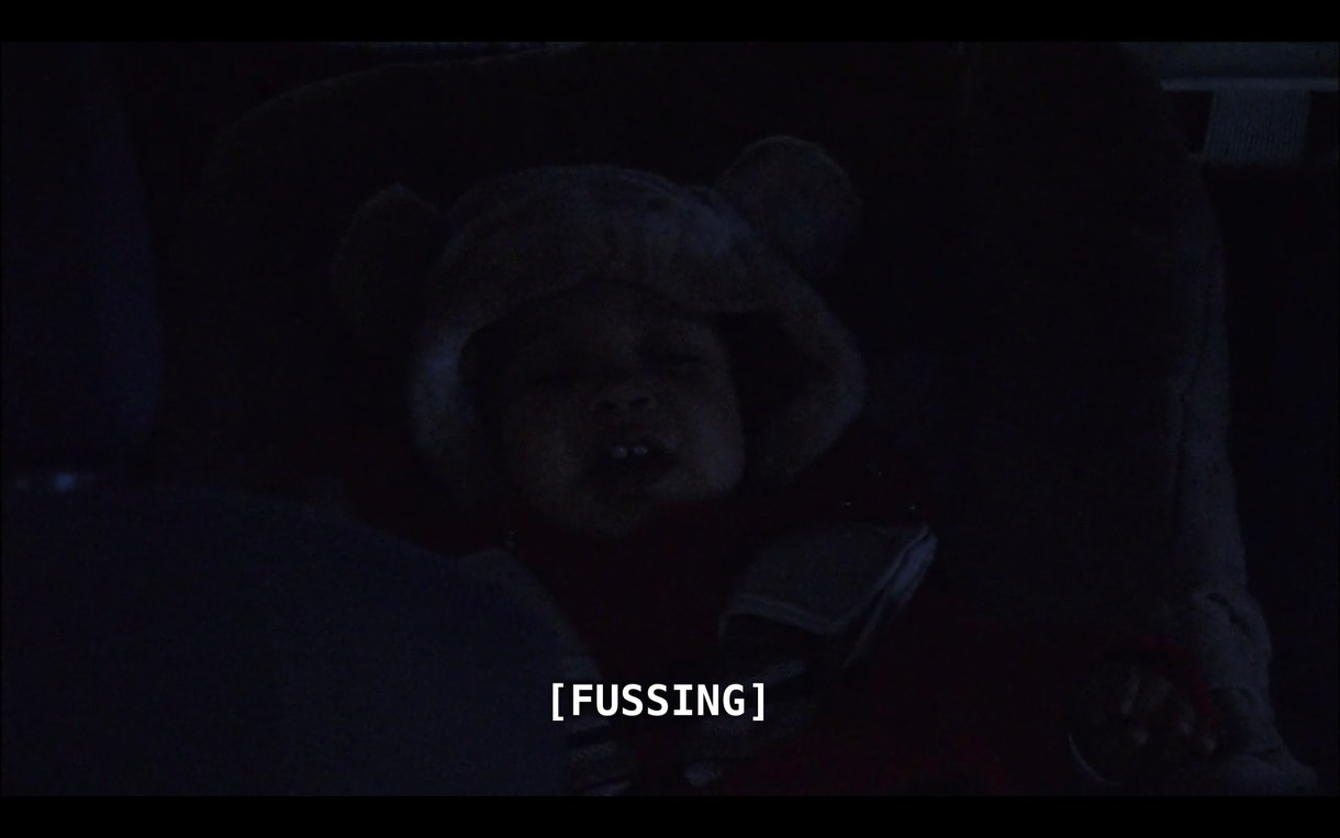 A very dark image in which Angelica and Bette are barely visible. The subtitles read, "Fussing," referring to Angelica.