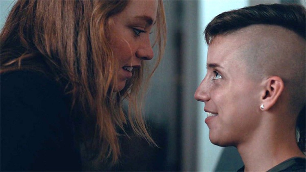 Two queer people stare at each other, one of whom has a mohawk. "Princess Cyd" is a lesbian movie available for streaming on Hulu.