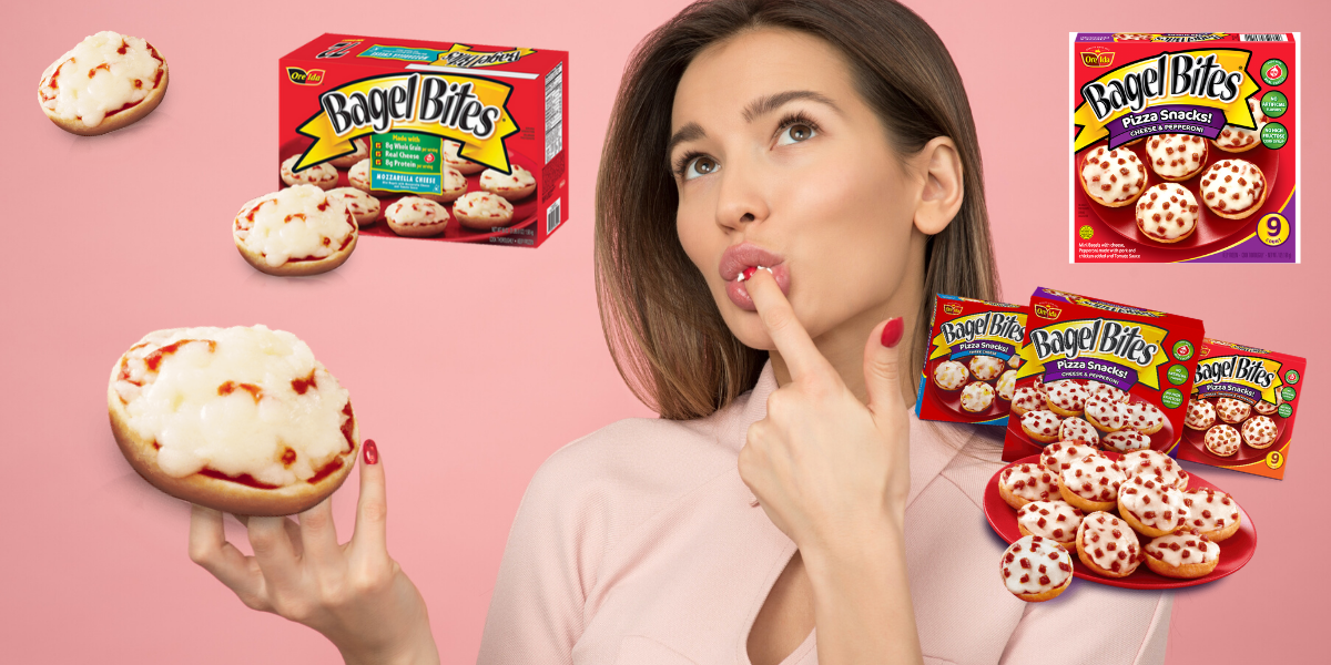 A woman with brown hair eats and sticks her finger in her mouth. She is surrounded by floating Bagel Bites and has her fingers stuck in one of them.