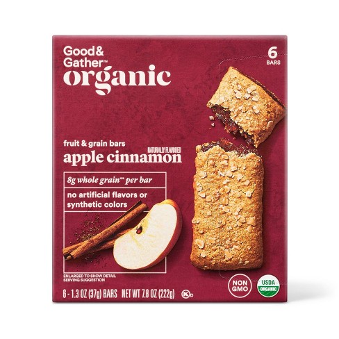 A maroon box of apple cinnamon bars with a little apple and cinnamon photo.