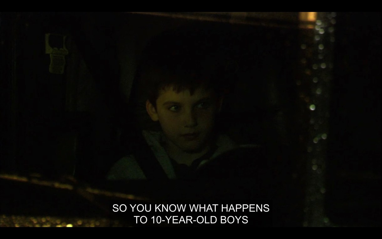 Shay is hitch-hiking and riding in a semi-truck. The driver, off screen, says to him, "So you know what happens to 10-year-old boys when they run away, don't you?"