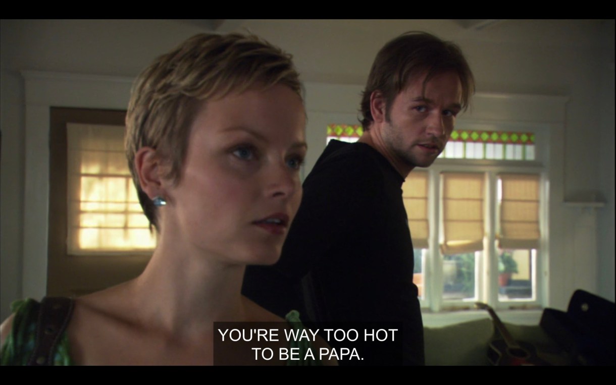 Angus looks over his shoulder at Mikey's nanny, a woman with a short blonde pixie cut. She says to Angus, "You're way too hot to be a papa."