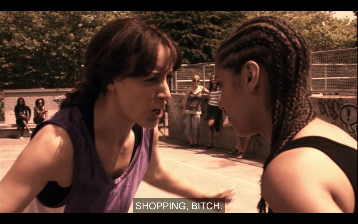 Bette blocking Papi on the basketball court.