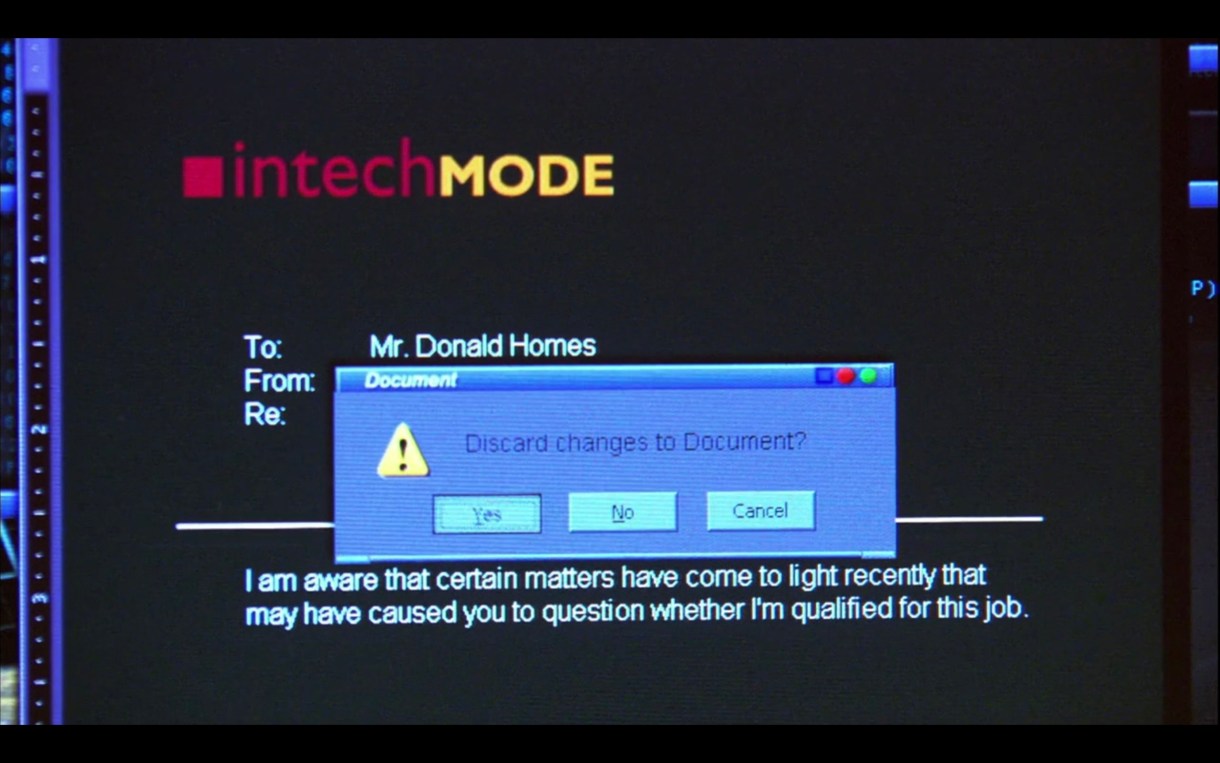 Computer screen from InTech Mode with an email that reads "I am aware that certain matters have come to light recently that may have caused you to question whether I'm qualified for this job." Above that text, a pop up window reads, "Discard changes to Document?"