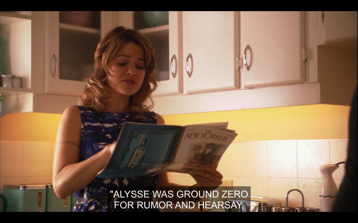 Alice (wearing a blue dress) stands in the kitchen holding The New Yorker magazine. She reads, "Alyssa was ground zero for rumor and hearsay."