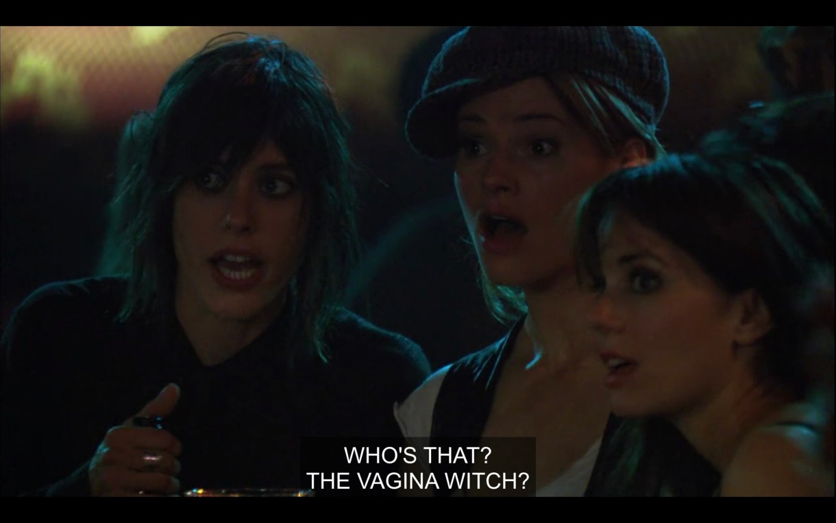 Shane, Alice, and Jenny stand next to each other in a bar with their jaws dropped. "Who's that? The vagina witch?"